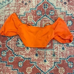 Orange/red crop top with semi open back from Shein. Size small